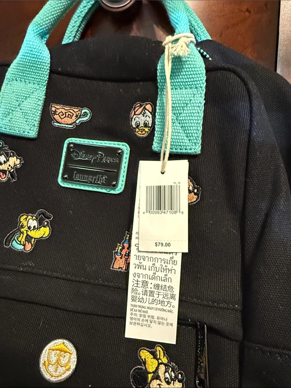 Loungefly Black Mini Backpack with Teal Handles and Straps